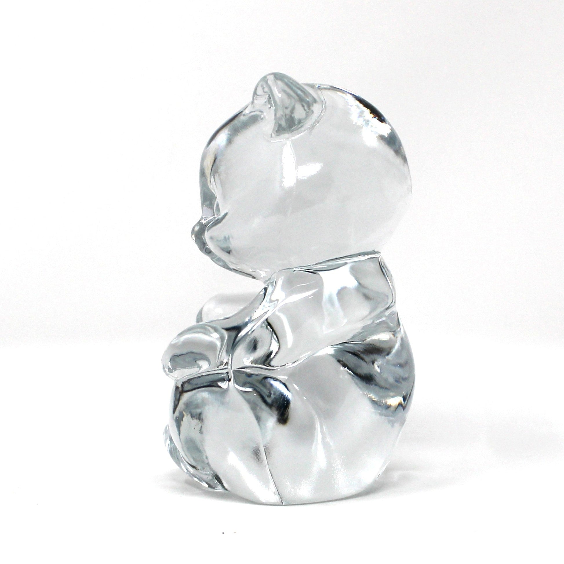 side view of Fenton's vintage clear glass bear figurine / paperweight.  