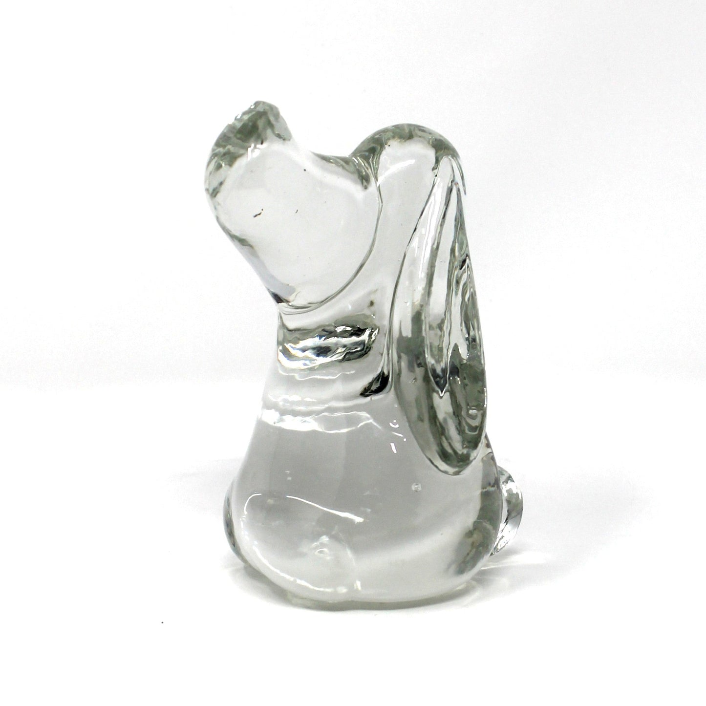 A small clear glass / crystal figurine shaped like a beagle or hound dog figure, .