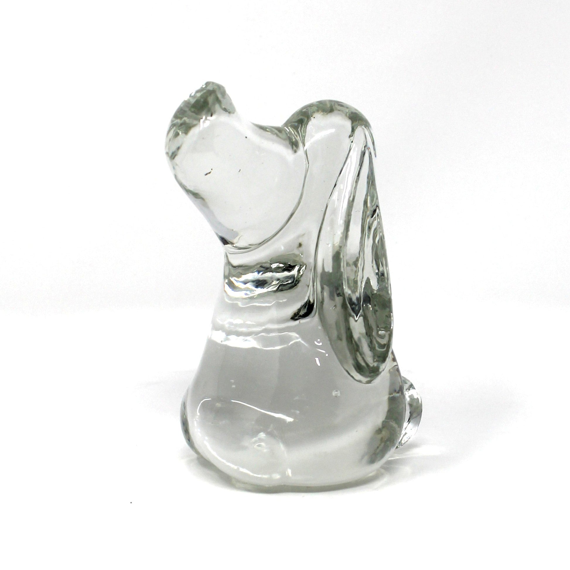 A small clear glass / crystal figurine shaped like a beagle or hound dog figure, .
