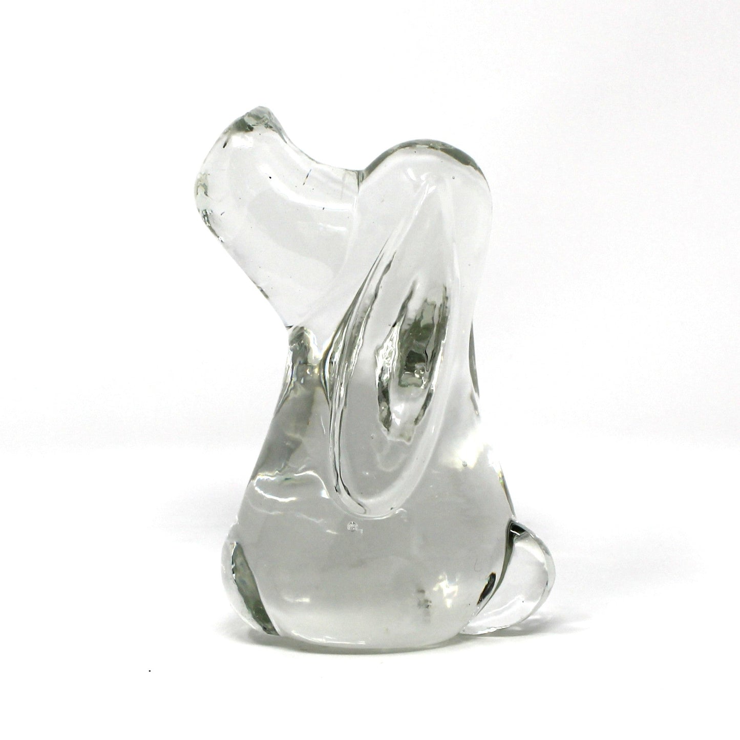 A small sculptural glass figurine, shaped like a Beagle or Hound Dog,  made of clear glass
