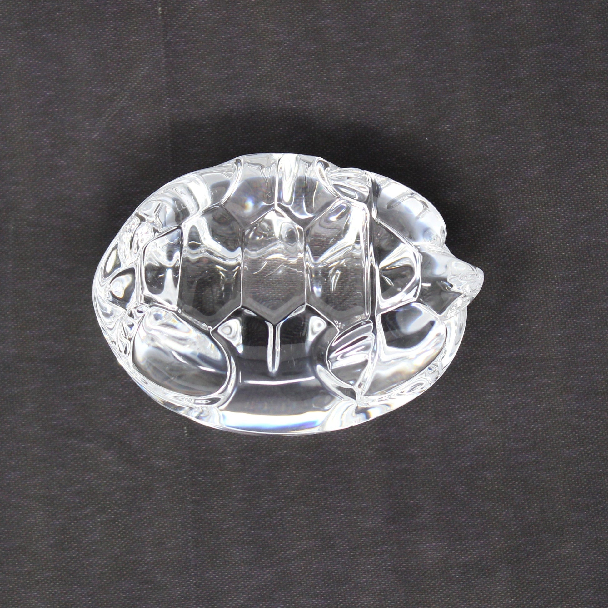 Bottom view of Steuben crystal turtle hand cooler, retired.
