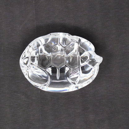 Bottom view of Steuben crystal turtle hand cooler, retired.