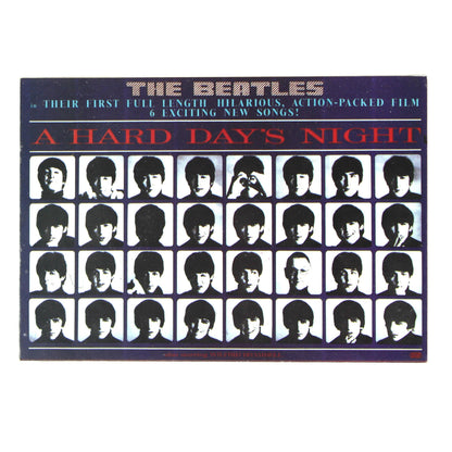 A vintage postcard featuring The Beatles' 'A Hard Day's Night' album artwork, with a grid of black-and-white portrait photos on a dark background.