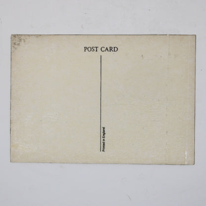 Back view of a vintage postcard featuring The Beatles' 'A Hard Day's Night' album. Back is cream-colored postcard with 'POST CARD' printed at the top and Made in England mark.