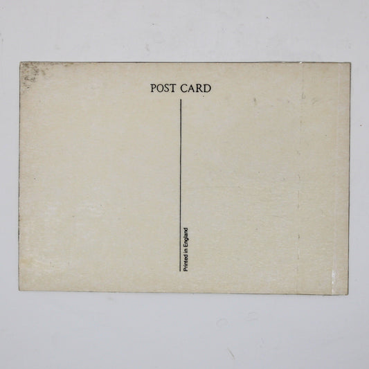 Back view of a vintage postcard featuring The Beatles' 'A Hard Day's Night' album. Back is cream-colored postcard with 'POST CARD' printed at the top and Made in England mark.