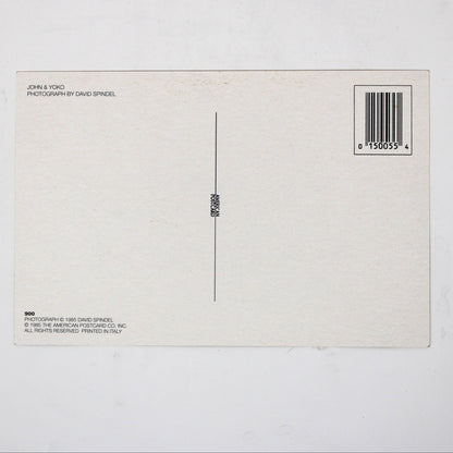 Back view of vintage postcard of John Lennon and Yoko Ono. Photo by David Spindel