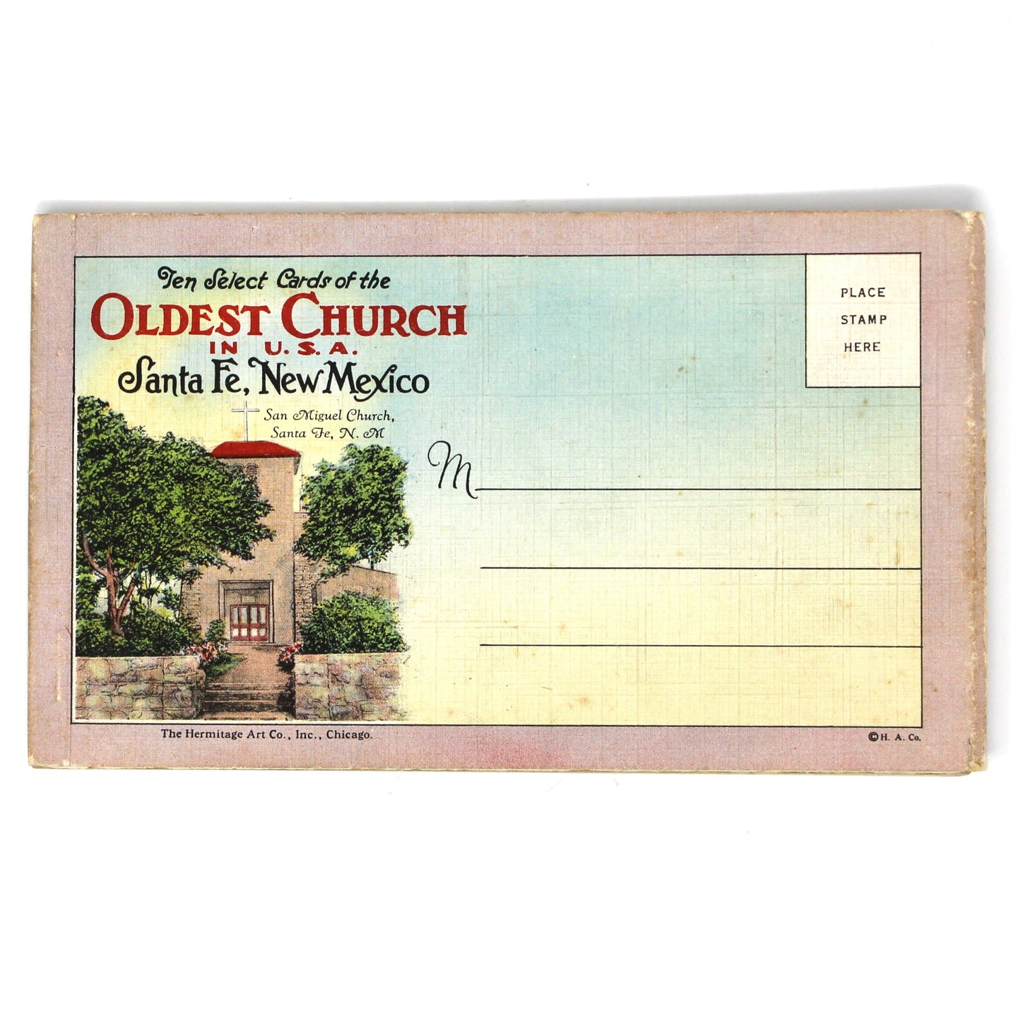 A vintage postcard book showing the Oldest Church in Santa Fe, New Mexico, with a printed illustration of the church and surrounding trees. Includes 10 cards.