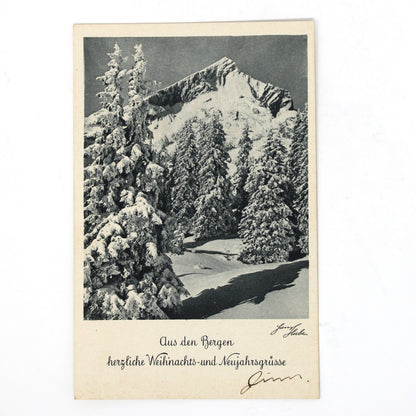 A vintage 1930s Christmas Postcard,  Unused, Hans Huber, Alpine Mountain Snow Scene, Germany