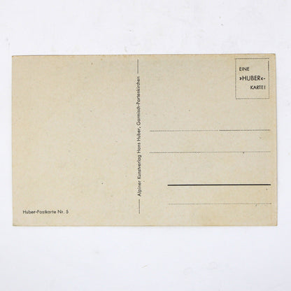 Back view of a vintage postcard with printed lines and text, picture by Hans Huber.
