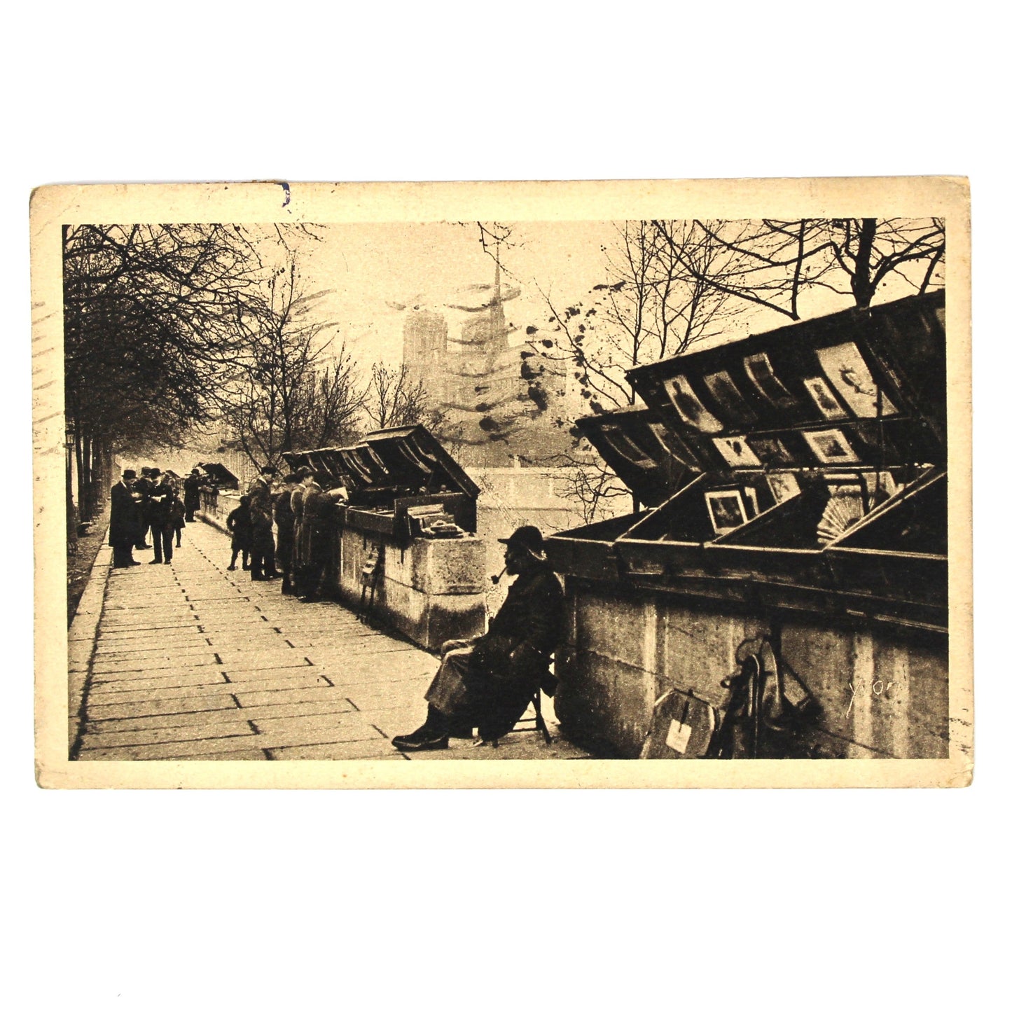 Antique black and white postcard, depicting a Paris street Bouquinistes, Quai de la Tournelle, Yvon. 