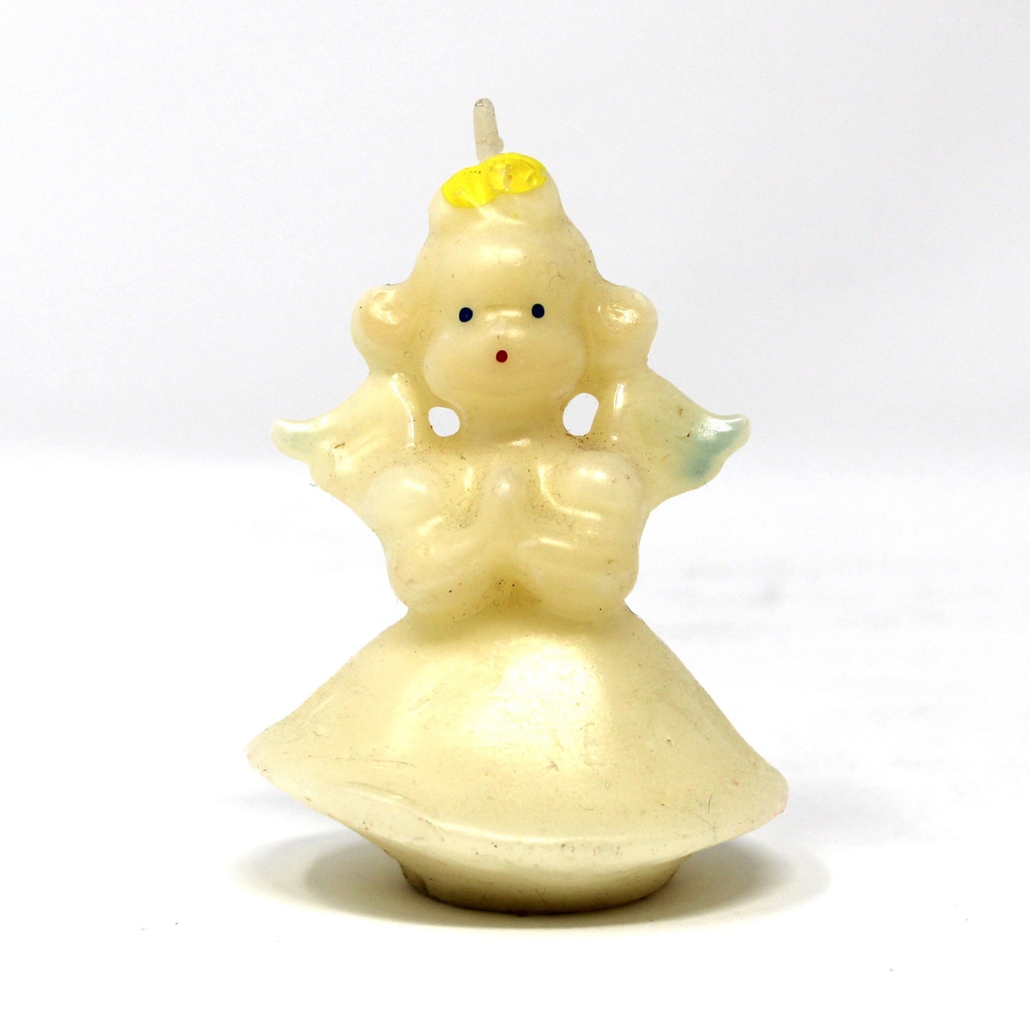 A vintage Gurley angel candle with blond hair and blue wings. 
