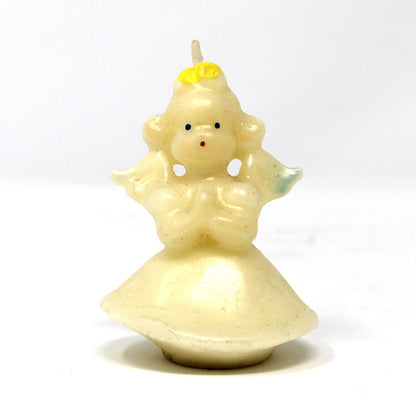 A vintage Gurley angel candle with blond hair and blue wings. 