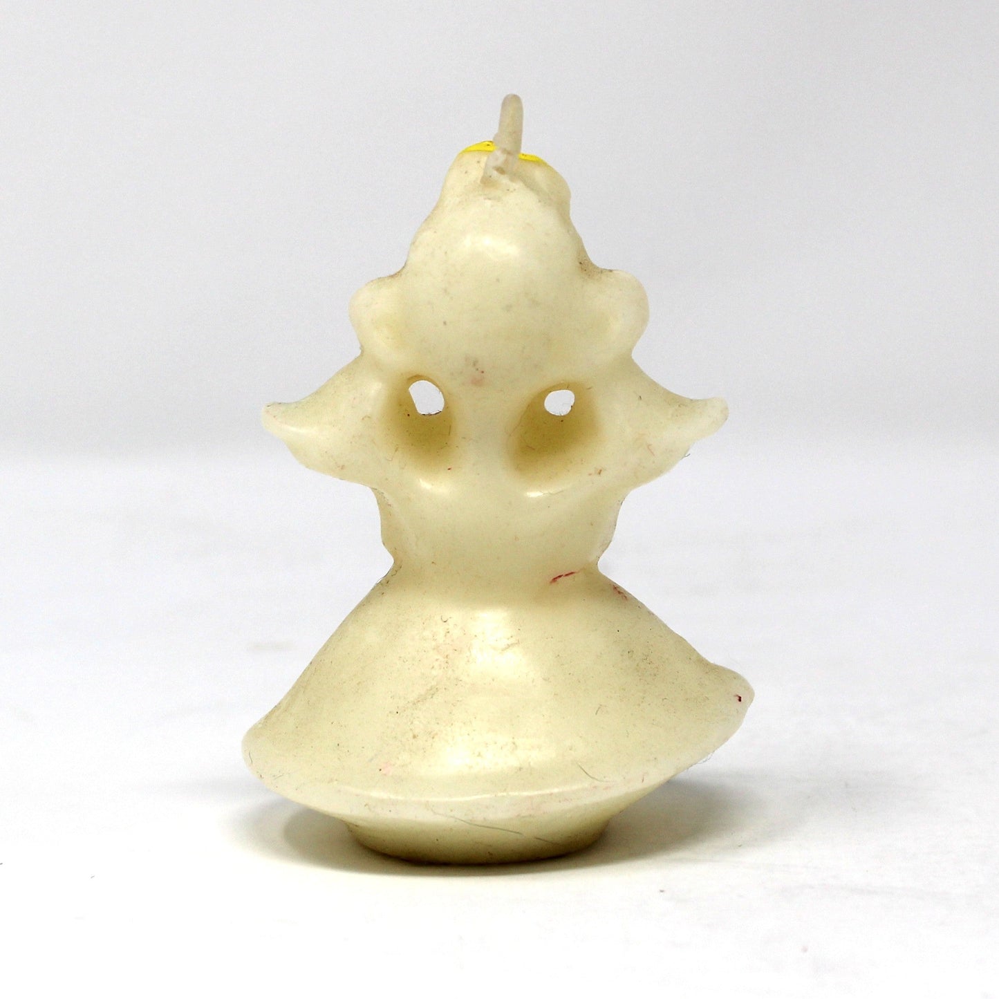 Back view of a vintage Gurley angel candle with blond hair and blue wings. 