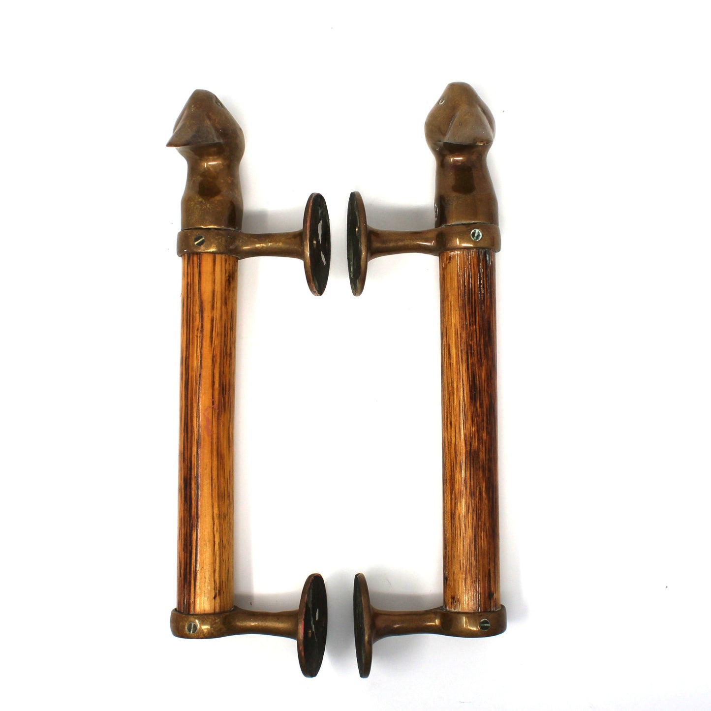 A pair of vintage-style wall door handles made of warm brown wood with bronze metal fittings and dark circular accents, shown against a plain white background.