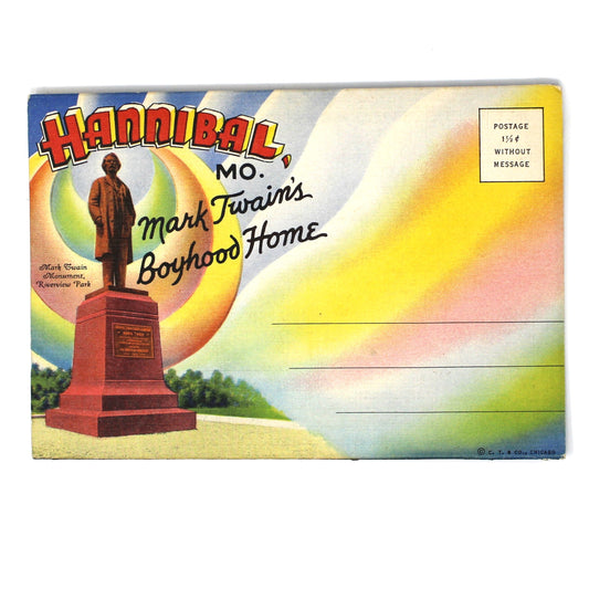 A vintage postcard featuring a colorful illustration of a monument in Hannibal, Missouri, with the text 'Mark Twain Boyhood Home' and a rainbow sunset background.
