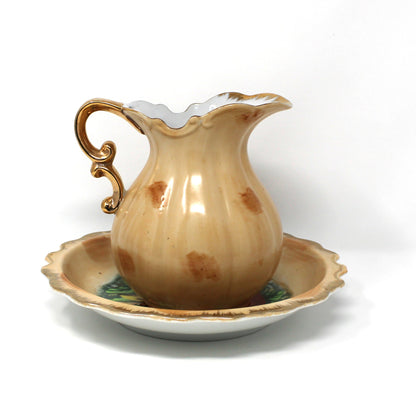 Back view of a vintage ceramic pitcher and basin set hand painted in Fall colors.