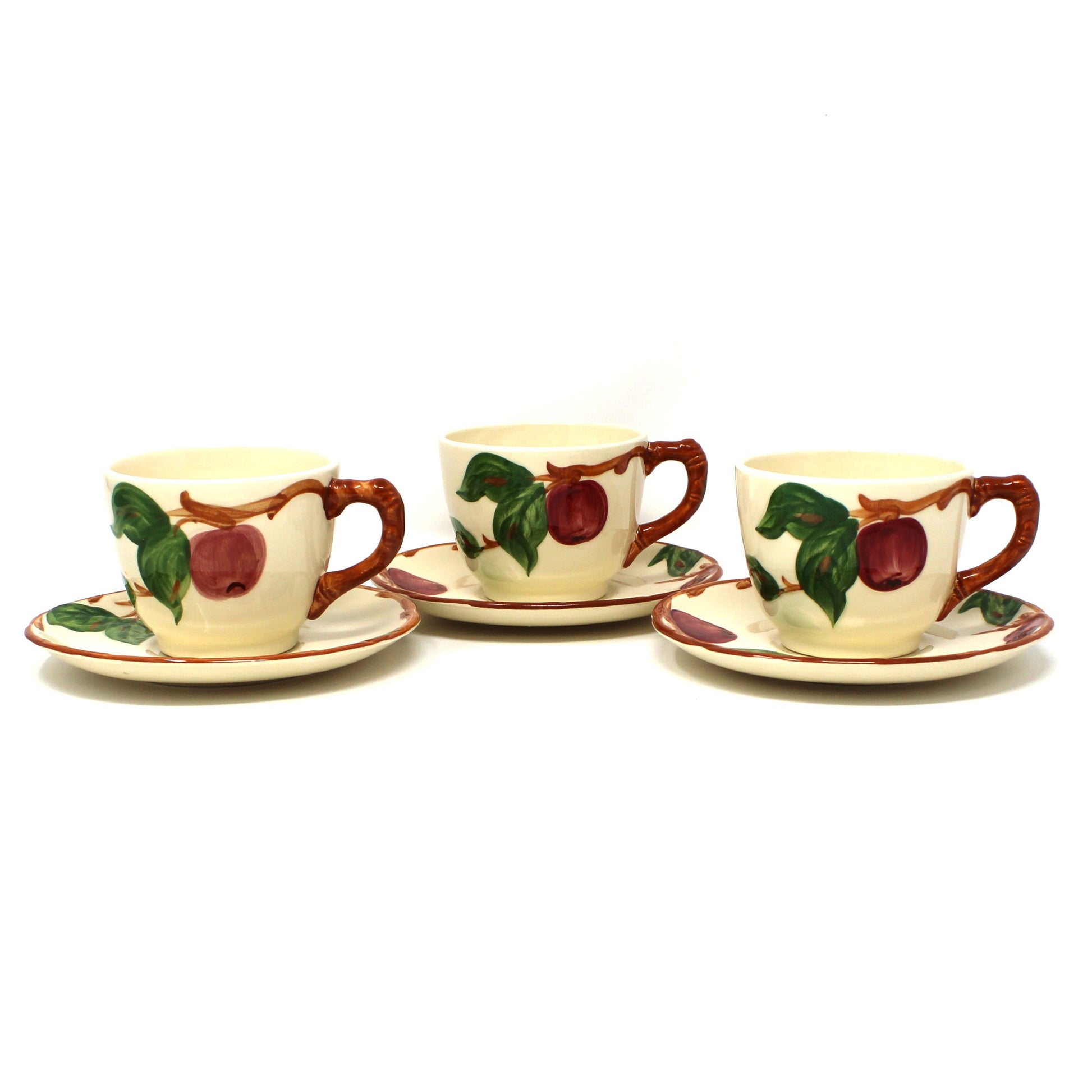 Set of 3 vintage Franciscan Apple cups and saucers.  Hand painted apples and green leaves on a cream-colored background.