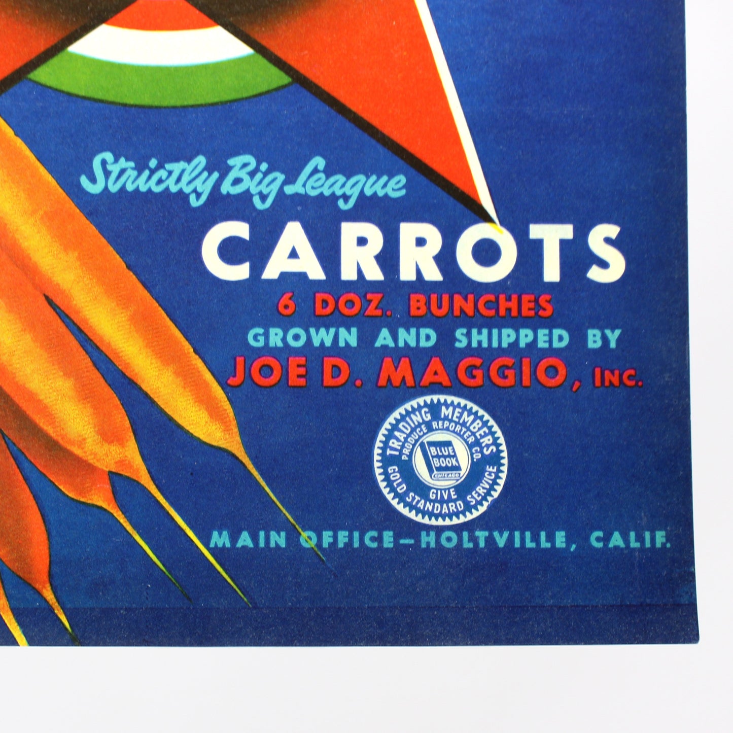 Vintage-style carrot advertisement print with bright orange carrots on a blue background, featuring the text 'Strictly Big-League CARROTS' and 'JOE D. MAGGIO, Inc.