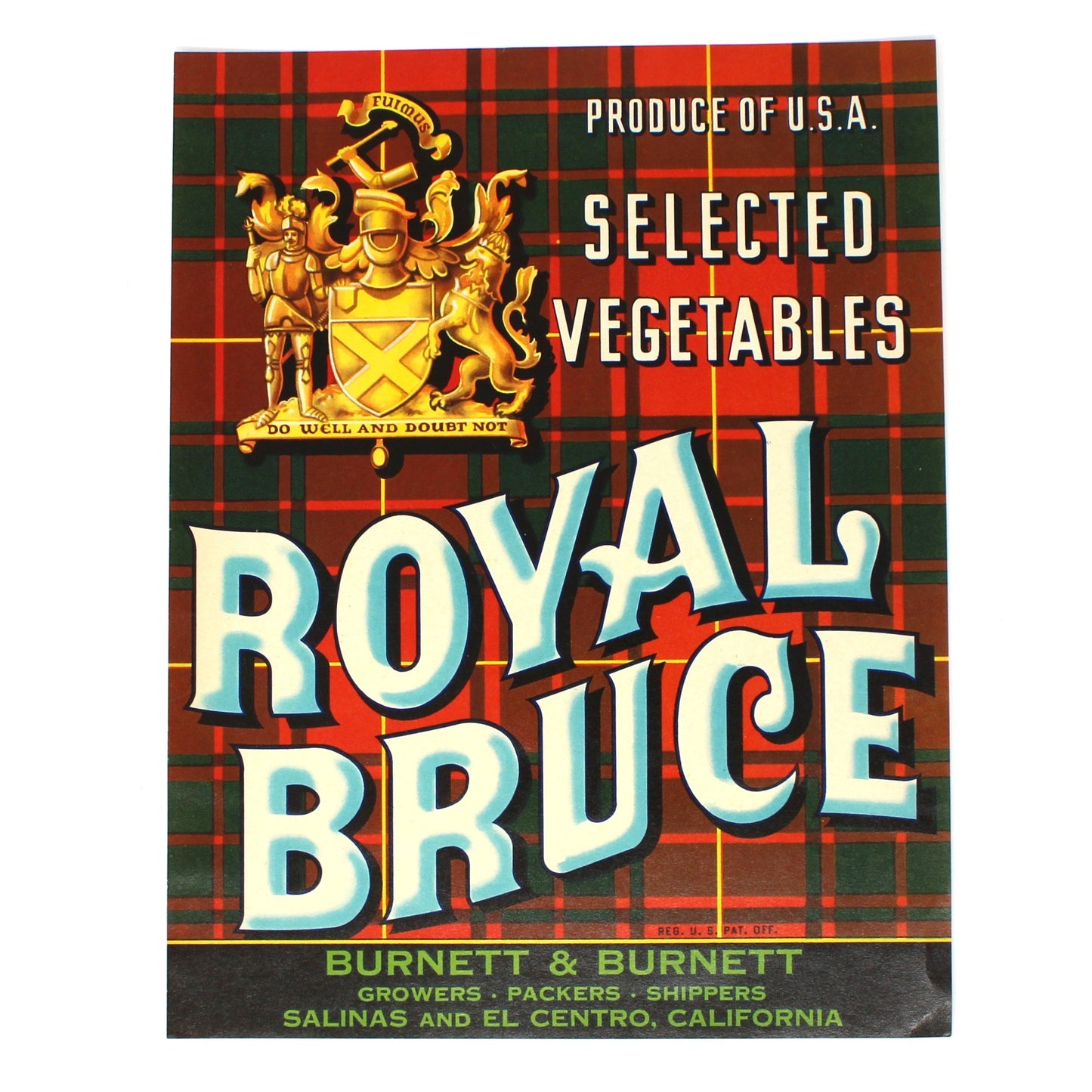 A vintage Royal Bruce Select vegetables crate label, featuring a red and green tartan pattern with a gold crest and large white text reading 'ROYAL BRUCE'.