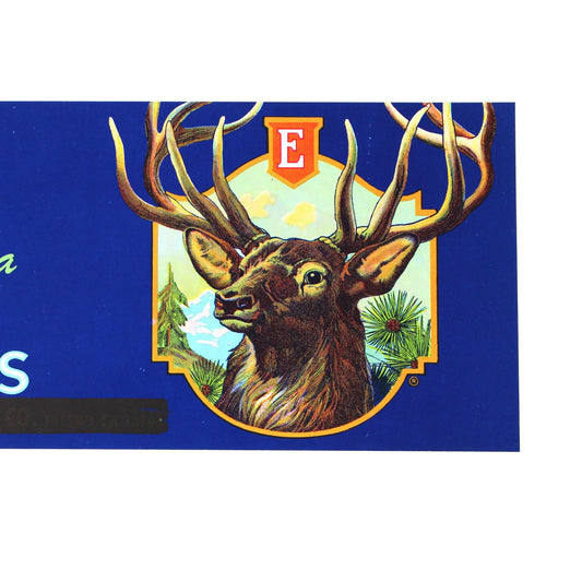 A vintage crate label featuring a stag head on a bright blue background.  Elk Brand California Grapes, featuring a large white and yellow Elk logo, the word 'California', 'GRAPES'.