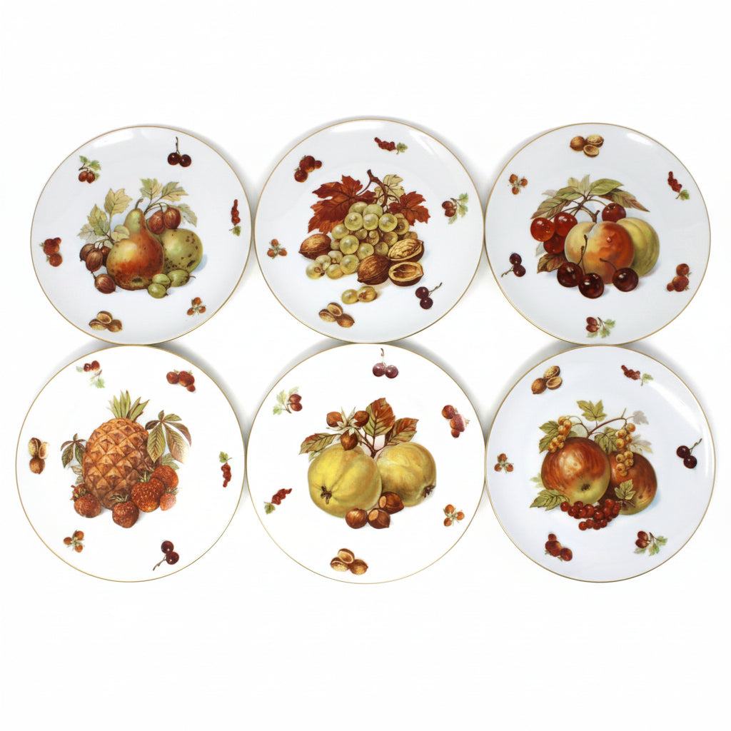 Vintage set of six Seltmann Weiden
Pattern Fruit and Nut (SLT83) plates. Each decorated with a different fruit illustration including apples, grapes, cherries, and a pineapple