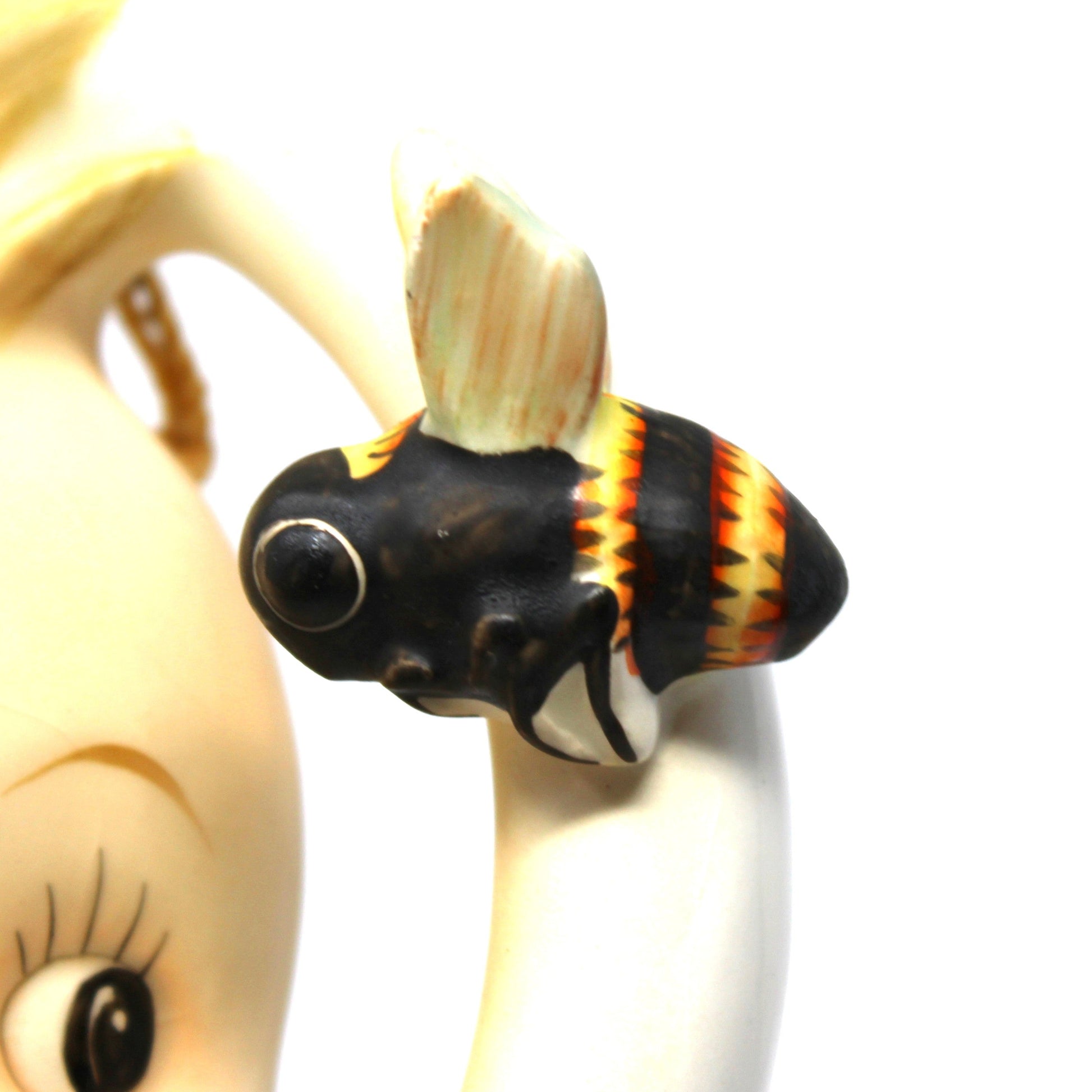 close up of bee on vintage Hummel Wall Plaque: Goebel Ba-Bee Ring Boy (30/0A), TMK-3 Stylized Bee, West Germany