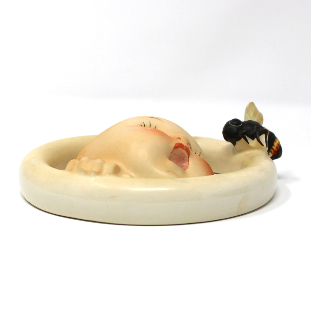 Side view of vintage Hummel Wall Plaque: Goebel Ba-Bee Ring Boy (30/0A), TMK-3 Stylized Bee, West Germany