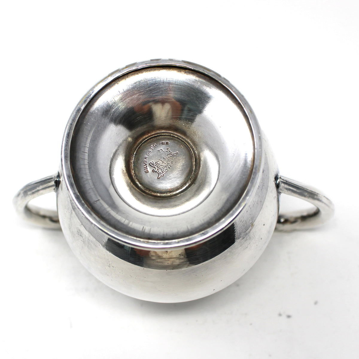 Bottom view from a Vintage 1930s Sugar Bowl by Lehman Brothers, Silverplate showing logo