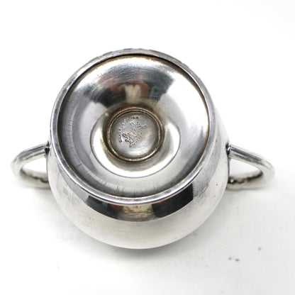Bottom view from a Vintage 1930s Sugar Bowl by Lehman Brothers, Silverplate showing logo