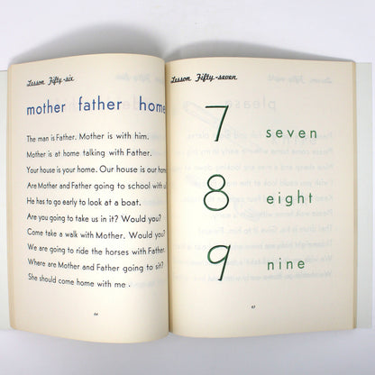 An open vintage children's book showing a page with the words 'mother father home' and large printed numbers 7, 8, and 9 in green.  Unused copy, dated 1959. Homeschooling book.