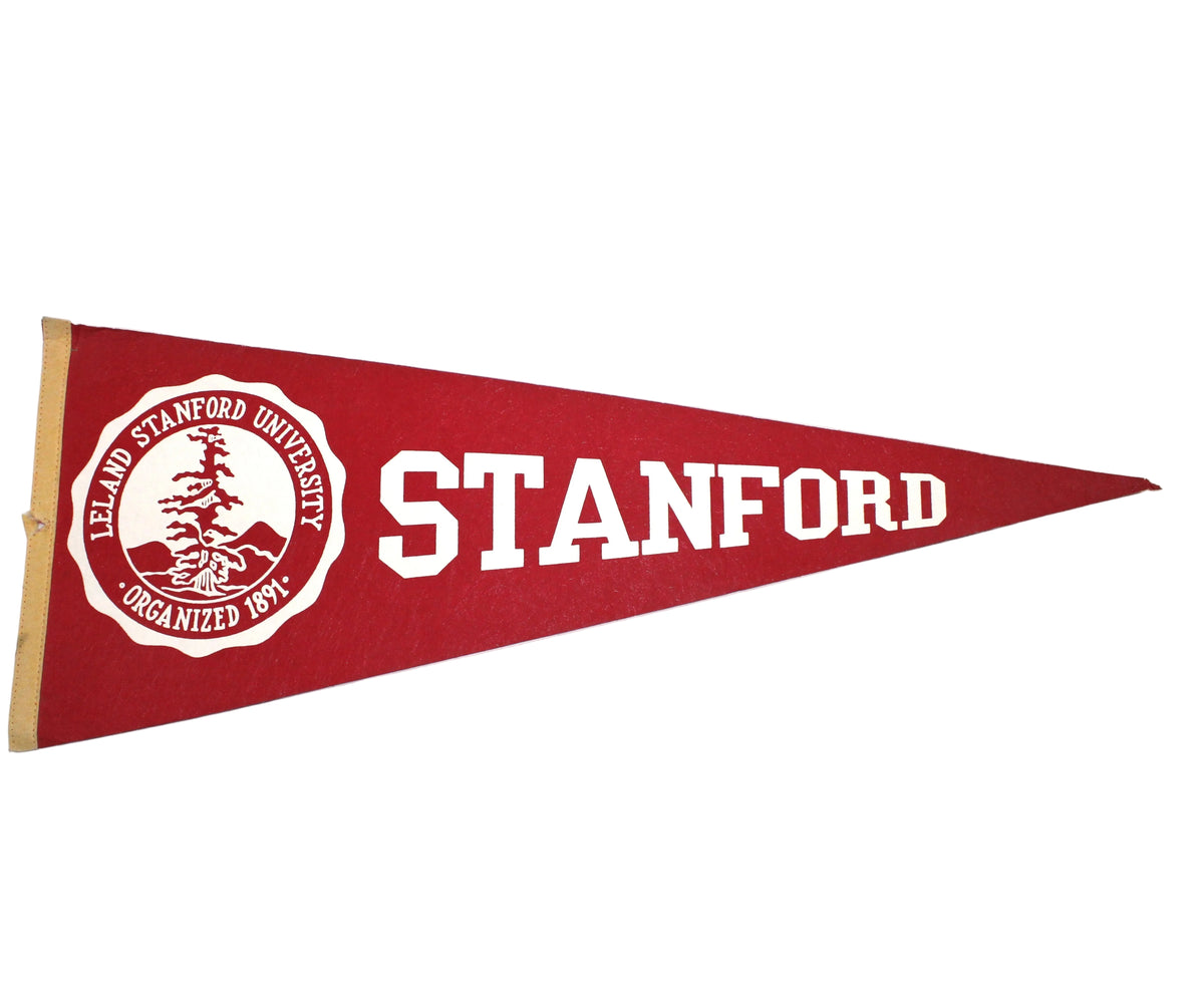 A red Stanford University vintage felt pennant flag with white lettering and the university seal on the left, 29" long.