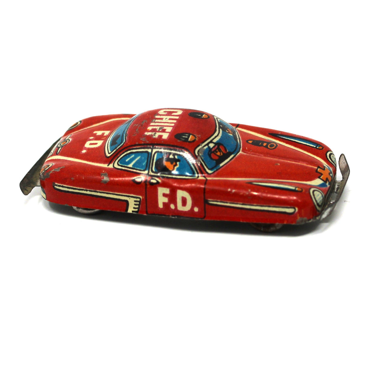 Side view of small 1950s Nakamura Japanese tin litho Fire Chief penny toy car.  