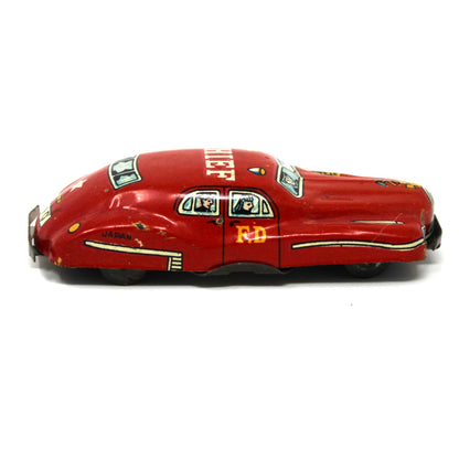 Side view of Vintage 1950s Japan Mini Tin Litho Fire Chief Toy Car, Red Fire Dept Sedan