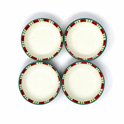 Four salt cellars and/or condiment dishes from Lenox Winter Greetings Everyday.  With green/red plaid tartan patterned edges.