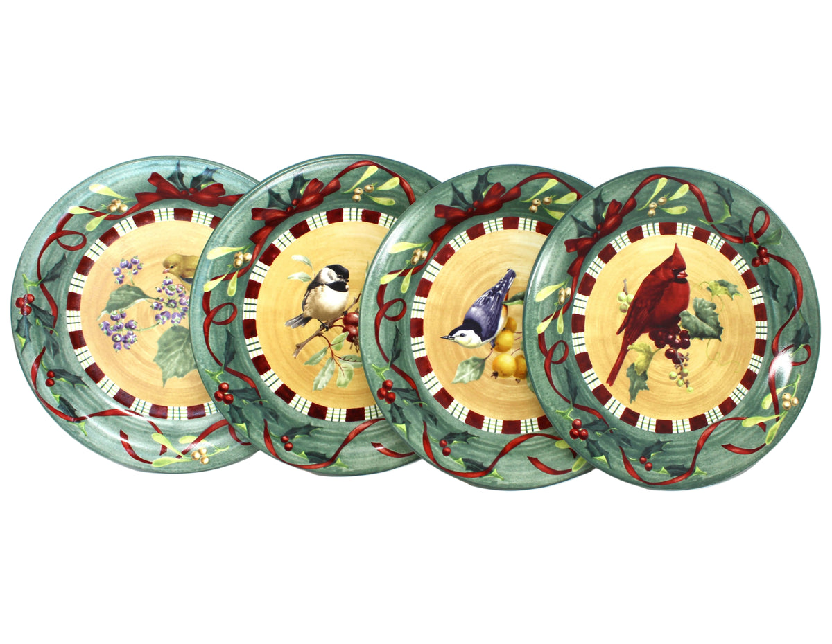 Four Lenox Winter Greetings Everyday holiday plates with bird illustrations, part of a complete dinnerware service for 4