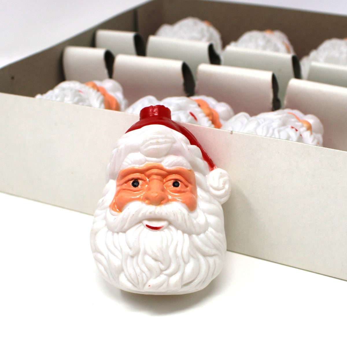 vintage Christmas light covers shaped like Santa's face, set of 10 in box.