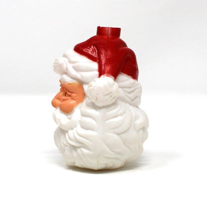side view of vintage Christmas Santa Face light cover