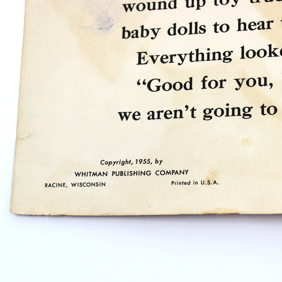 A close-up of a vintage children's book page with printed text, showing copyright 1955 for Whitman Publishing Company, Racine, Wisconsin