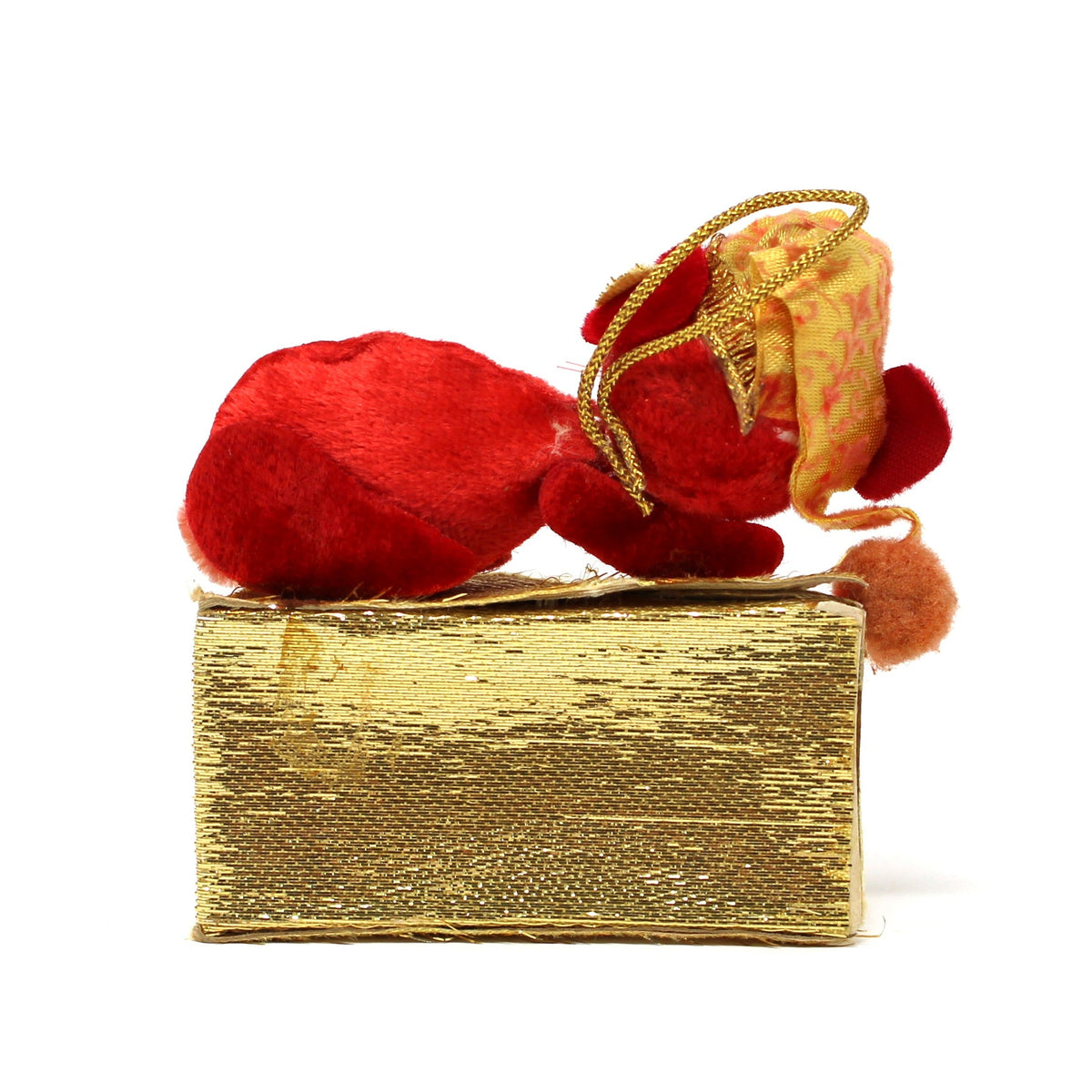 Back view of a vintage Mr. Christmas mouse sleeping on cheese ornament showing fabric and felt details.