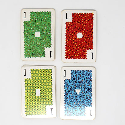 View of every color suit in vintage Slap Jack game from Whitman