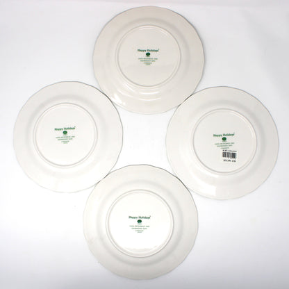 Set of Four vintage white ceramic dinner plates from NIKKO Japan back view of logo.  