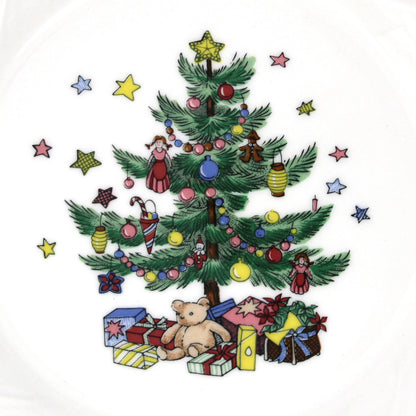 Close up of design on Nikko Happy Holidays Salad Plates with decorated Christmas tree, teddy bear and gift boxes.