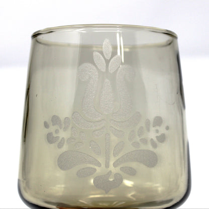 close up view of the etched floral pattern on vintage water goblet from Pfaltzgraff in the Village pattern.