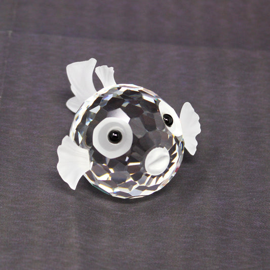 A vintage Swarovski Blow Fish crystal sculpture.  Faceted crystal puffer fish with black eyes. 