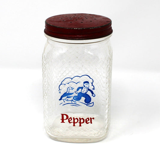 Vintage glass pepper shaker with red lid and Dutch boy with goose design.  Waffle glass square jar.
