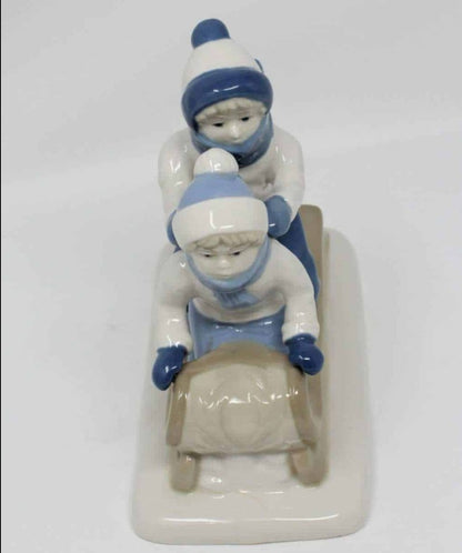 Figurine, Boy & Girl On Sled, Porcelana de Cuernavaca, Mexico, Vintage
