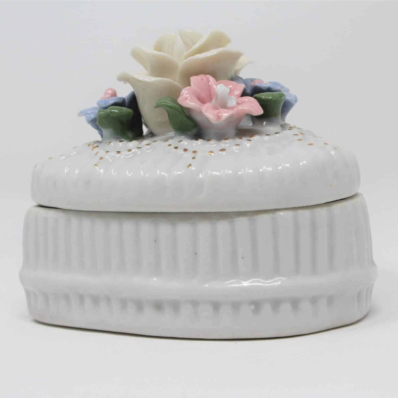 porcelain trinket box with hand applied flowers
